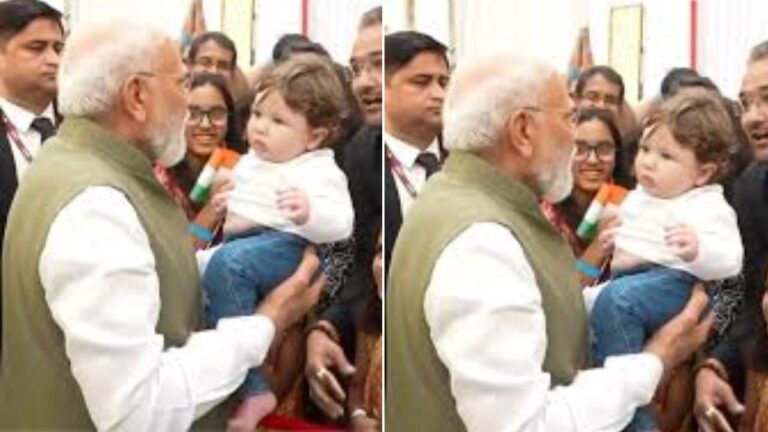 ఓహో ఆ చిన్నారిని మోదీ ఎత్తుకోవడం వెనుక ఇంతటి కథ ఉందా